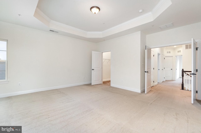 1427 Chanery Ct, Odenton, MD 21113 - empty room with ornamental molding, a tray ceiling, light carpet, and baseboards