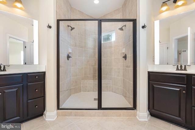 1427 Chanery Ct, Odenton, MD 21113 - bathroom featuring a shower stall, two vanities, and tile patterned floors