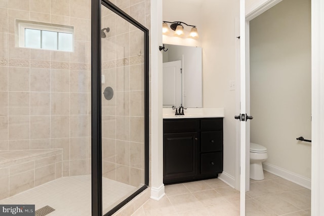 1427 Chanery Ct, Odenton, MD 21113 - full bathroom featuring a stall shower, tile patterned flooring, toilet, vanity, and baseboards