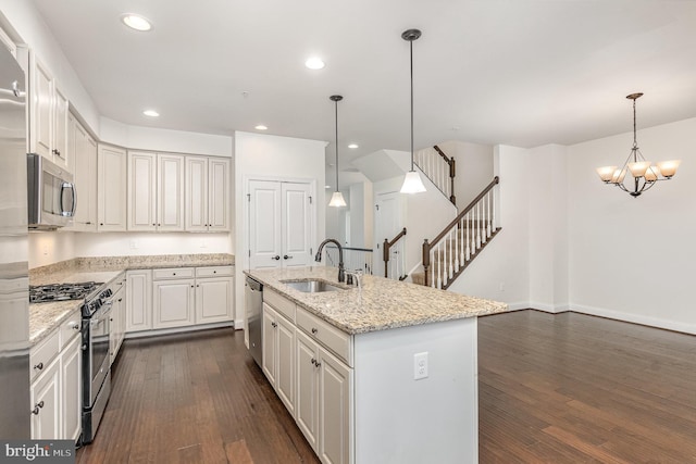1427 Chanery Ct, Odenton, MD 21113 - kitchen with appliances with stainless steel finishes, a sink, dark wood finished floors, a chandelier, and white cabinets
