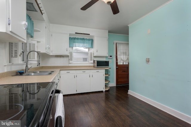 527 Eshelman St, Highspire, PA 17034 - kitchen with a sink, black / electric stove, ceiling fan, light countertops, and stainless steel microwave