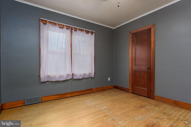 527 Eshelman St, Highspire, PA 17034 - unfurnished room with ornamental molding, hardwood / wood-style flooring, and baseboards