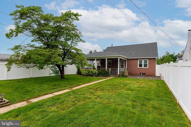 527 Eshelman St, Highspire, PA 17034 - view of front of property with brick siding, a patio area, and roof with shingles