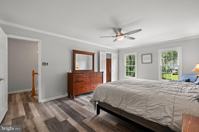 11680 Pellow Circle Ct, Herndon, VA 20170 - bedroom featuring ornamental molding, wood finished floors, a ceiling fan, and baseboards