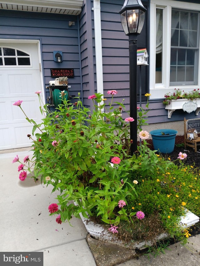 property entrance with a garage