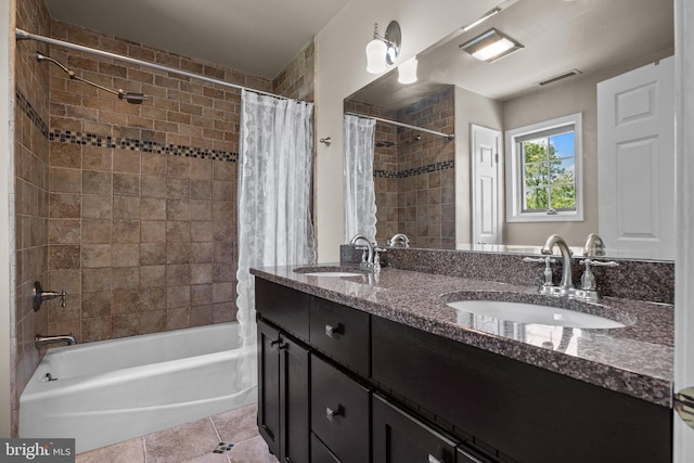 full bathroom featuring shower / bathtub combination with curtain, tile patterned floors, and double vanity