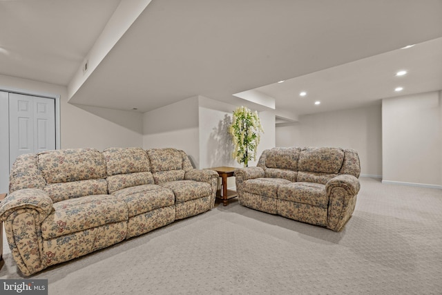 living area featuring recessed lighting, carpet floors, and baseboards