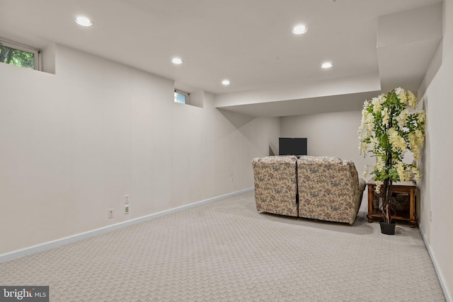 living area with carpet floors, recessed lighting, baseboards, and healthy amount of natural light