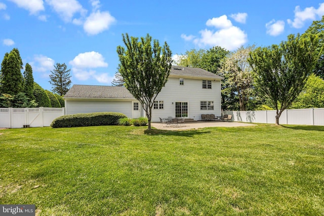 rear view of property with a patio area