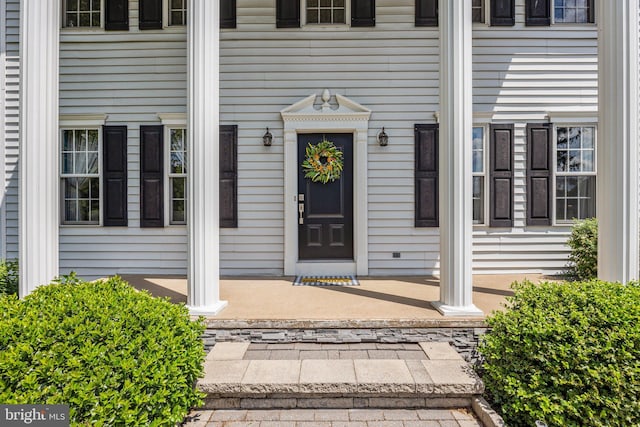 property entrance with a porch