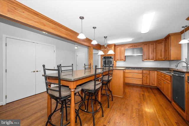 4211 Springview, Jefferson, MD 21755 - kitchen featuring dishwashing machine, ventilation hood, dark wood-style flooring, a kitchen island, and brown cabinetry