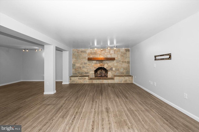 4211 Springview, Jefferson, MD 21755 - unfurnished living room with wood finished floors, a fireplace, and baseboards
