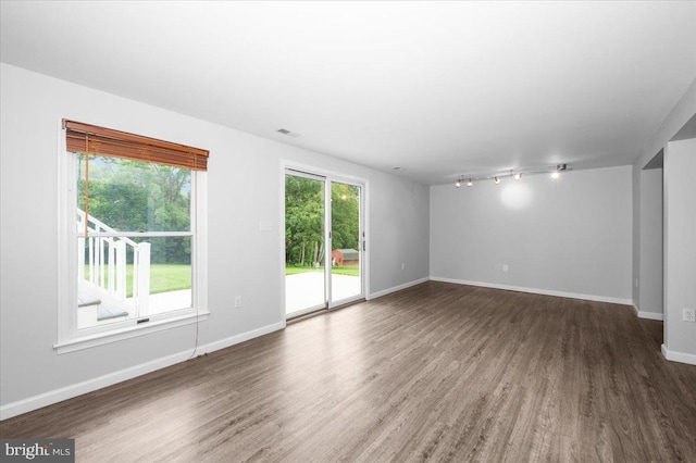4211 Springview, Jefferson, MD 21755 - unfurnished room with wood finished floors, baseboards, and rail lighting