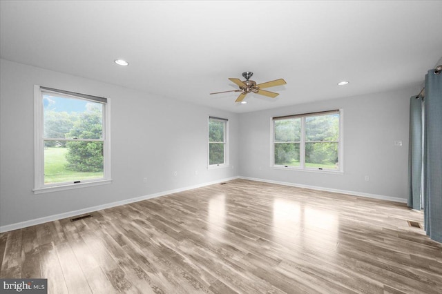 4211 Springview, Jefferson, MD 21755 - empty room with healthy amount of natural light, light wood-style floors, baseboards, ceiling fan, and recessed lighting