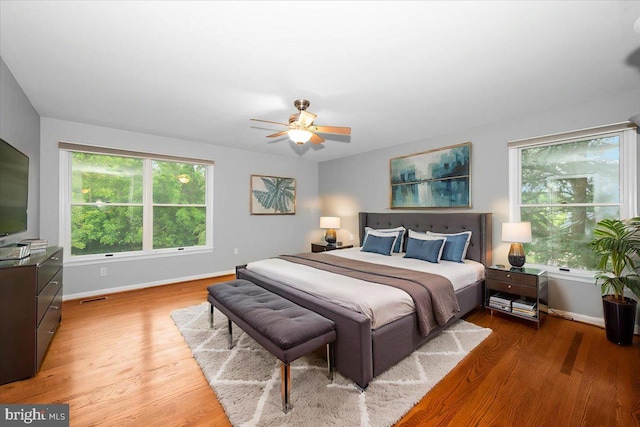 4211 Springview, Jefferson, MD 21755 - bedroom with baseboards, wood finished floors, and a ceiling fan