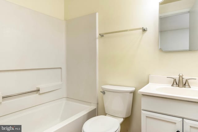 bathroom with vanity, toilet, and shower / bath combination