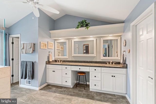 12702 Purdham Dr, Woodbridge, VA 22192 - full bathroom featuring lofted ceiling, a ceiling fan, double vanity, and baseboards