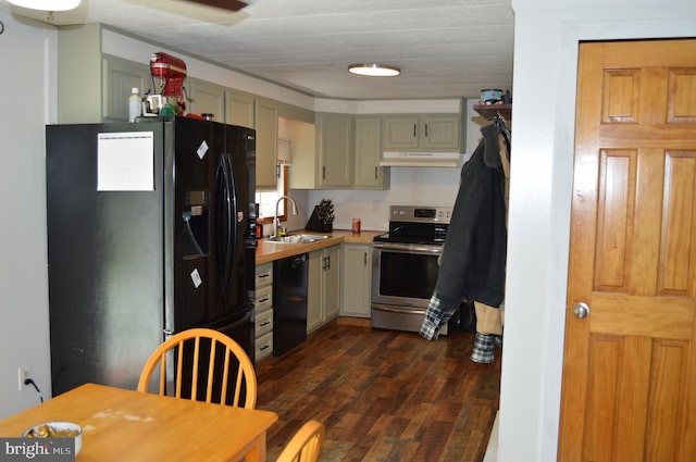 kitchen featuring black appliances, a sink, dark wood finished floors, and under cabinet range hood