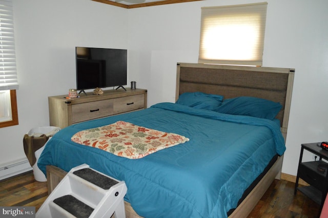 bedroom featuring wood finished floors