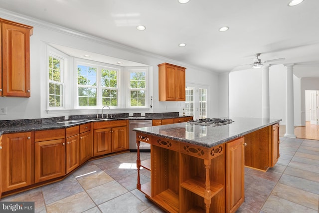 kitchen with stainless steel appliances, open shelves, a center island, crown molding, and recessed lighting