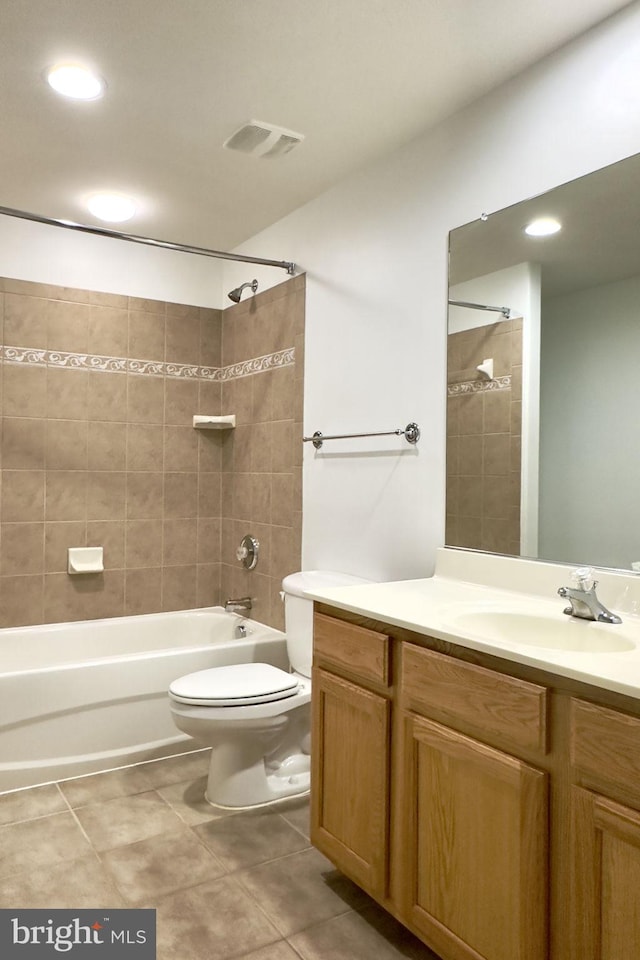 bathroom featuring toilet, shower / bathtub combination, tile patterned flooring, vanity, and recessed lighting