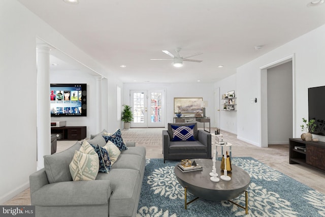 living room with ceiling fan, baseboards, french doors, recessed lighting, and light colored carpet