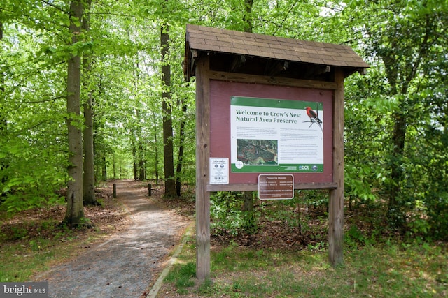 view of home's community featuring a view of trees