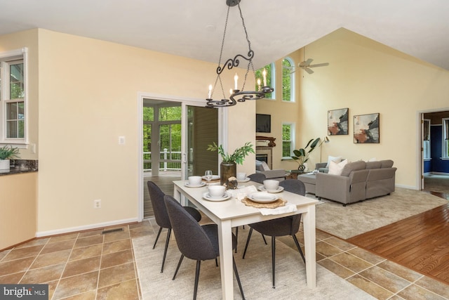 2200 Exeter Ct, Fallston, MD 21047 - dining space with a chandelier, baseboards, a high ceiling, and a ceiling fan