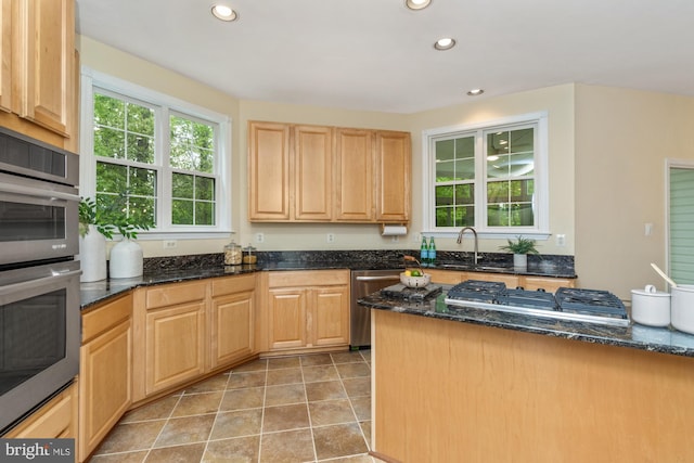 2200 Exeter Ct, Fallston, MD 21047 - kitchen with stainless steel appliances, recessed lighting, a sink, light brown cabinets, and dark stone counters