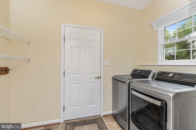 2200 Exeter Ct, Fallston, MD 21047 - clothes washing area with washer and dryer, light tile patterned floors, and baseboards