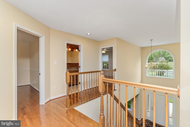 2200 Exeter Ct, Fallston, MD 21047 - hallway with an upstairs landing, wood finished floors, baseboards, and recessed lighting
