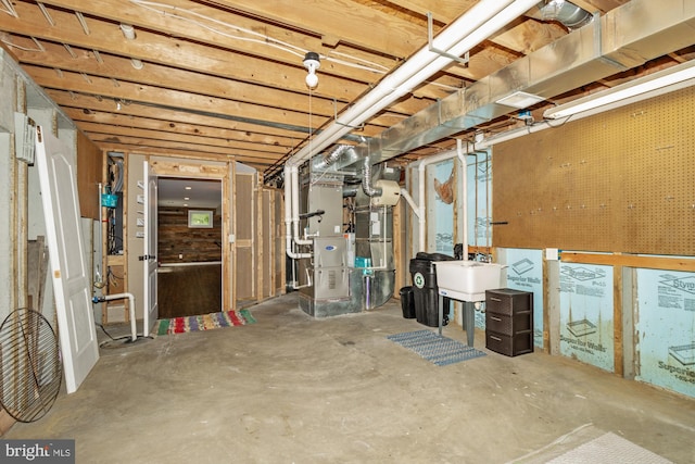 2200 Exeter Ct, Fallston, MD 21047 - unfinished below grade area featuring a sink and heating unit