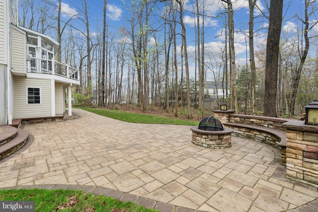 2200 Exeter Ct, Fallston, MD 21047 - view of patio with an outdoor fire pit and a balcony