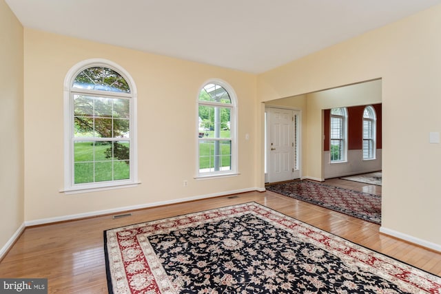 2200 Exeter Ct, Fallston, MD 21047 - foyer featuring wood-type flooring, healthy amount of natural light, and baseboards