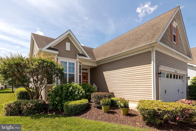 31766 Chablis Ln Unit 76, Lewes, DE 19958 - view of front of home with roof with shingles and a garage