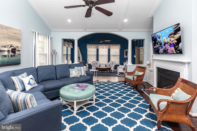 31766 Chablis Ln Unit 76, Lewes, DE 19958 - living area featuring ornate columns, ceiling fan, a fireplace, wood ceiling, and recessed lighting