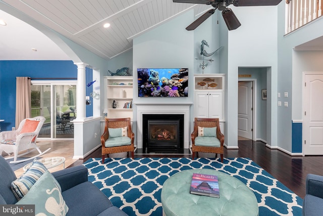 31766 Chablis Ln Unit 76, Lewes, DE 19958 - living area featuring decorative columns, arched walkways, high vaulted ceiling, wood finished floors, and ceiling fan