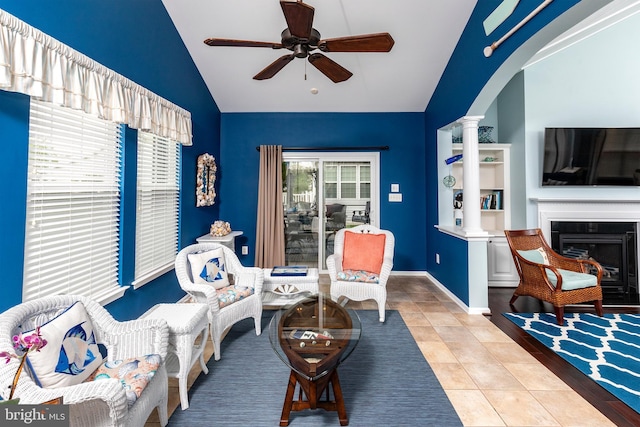 31766 Chablis Ln Unit 76, Lewes, DE 19958 - living room featuring lofted ceiling, plenty of natural light, decorative columns, a ceiling fan, and tile patterned floors