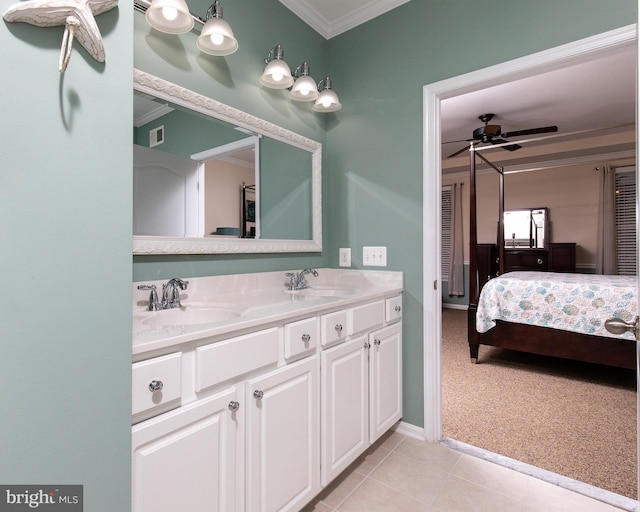 31766 Chablis Ln Unit 76, Lewes, DE 19958 - ensuite bathroom featuring crown molding, double vanity, tile patterned flooring, and a ceiling fan