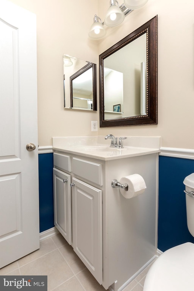 31766 Chablis Ln Unit 76, Lewes, DE 19958 - bathroom featuring toilet, tile patterned floors, vanity, and baseboards