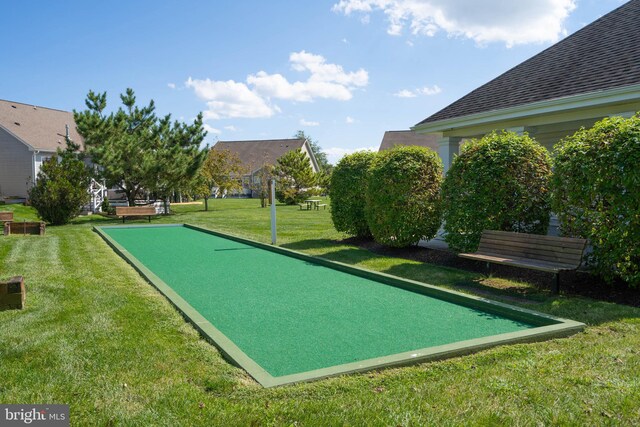 31766 Chablis Ln Unit 76, Lewes, DE 19958 - surrounding community featuring a bocce ball area and a yard