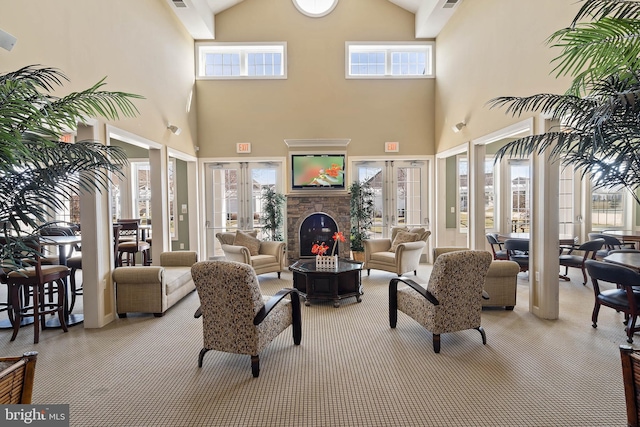 31766 Chablis Ln Unit 76, Lewes, DE 19958 - living room featuring french doors, carpet flooring, healthy amount of natural light, and high vaulted ceiling