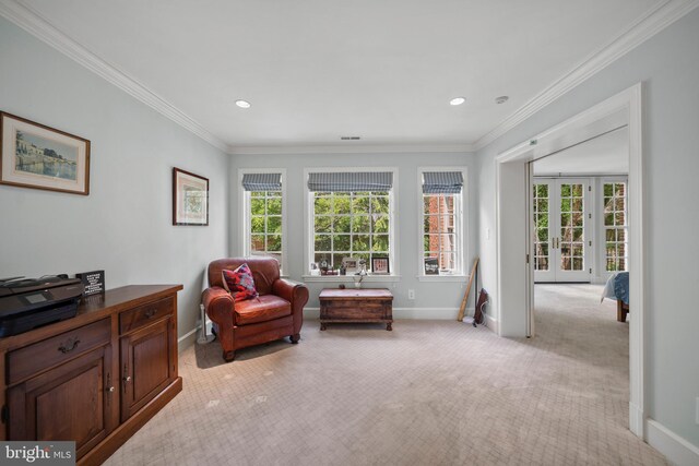 living area with light carpet, baseboards, crown molding, french doors, and recessed lighting