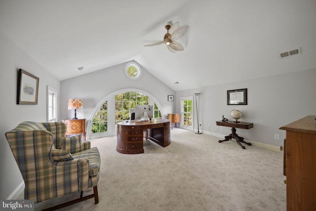 carpeted office featuring ceiling fan, lofted ceiling, and baseboards
