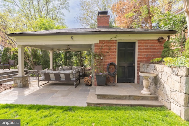 view of patio with an outdoor hangout area and ceiling fan
