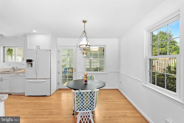 7607 Newcastle Dr, Annandale, VA 22003 - dining space with plenty of natural light, light wood finished floors, recessed lighting, and baseboards