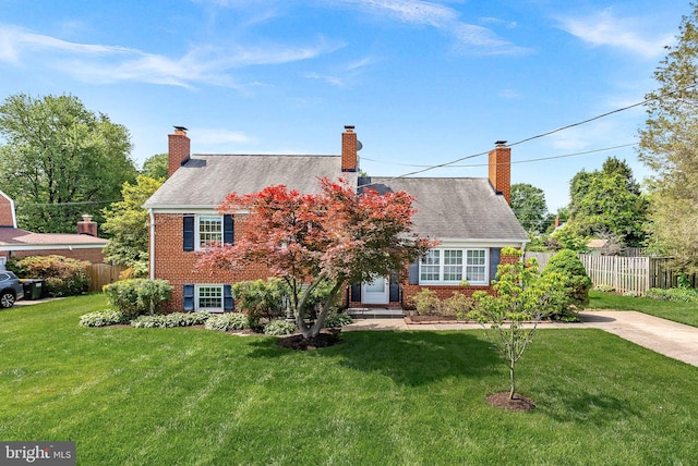 7607 Newcastle Dr, Annandale, VA 22003 - view of front of house featuring brick siding and a chimney