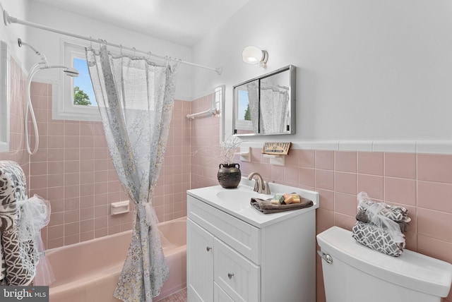 7607 Newcastle Dr, Annandale, VA 22003 - bathroom with shower / bath combo with shower curtain, tile walls, vanity, and toilet