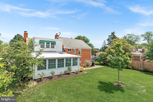 7607 Newcastle Dr, Annandale, VA 22003 - rear view of property with a chimney