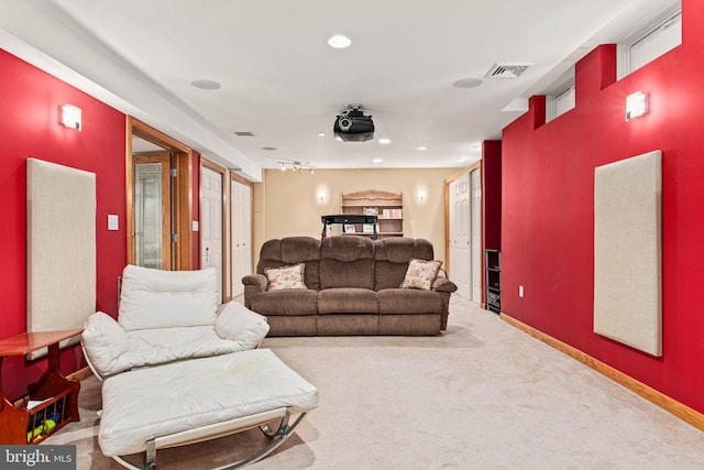 living room featuring carpet, recessed lighting, and baseboards